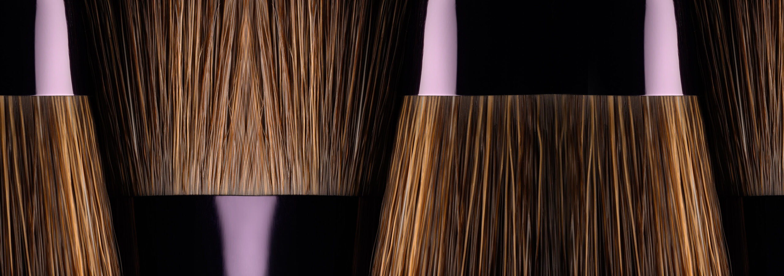 Close-up makeup brushes applying product